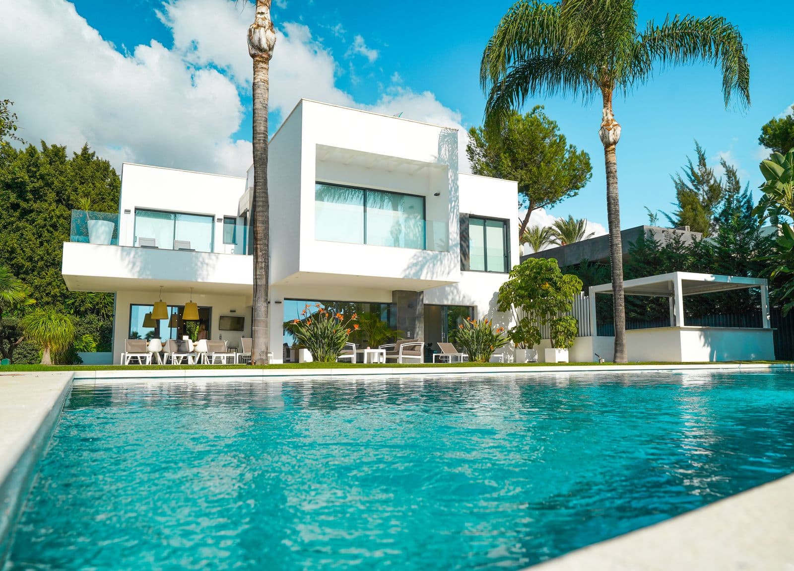 Luxury modern villa in Athens with limestone walls and infinity pool — Living Group real estate development