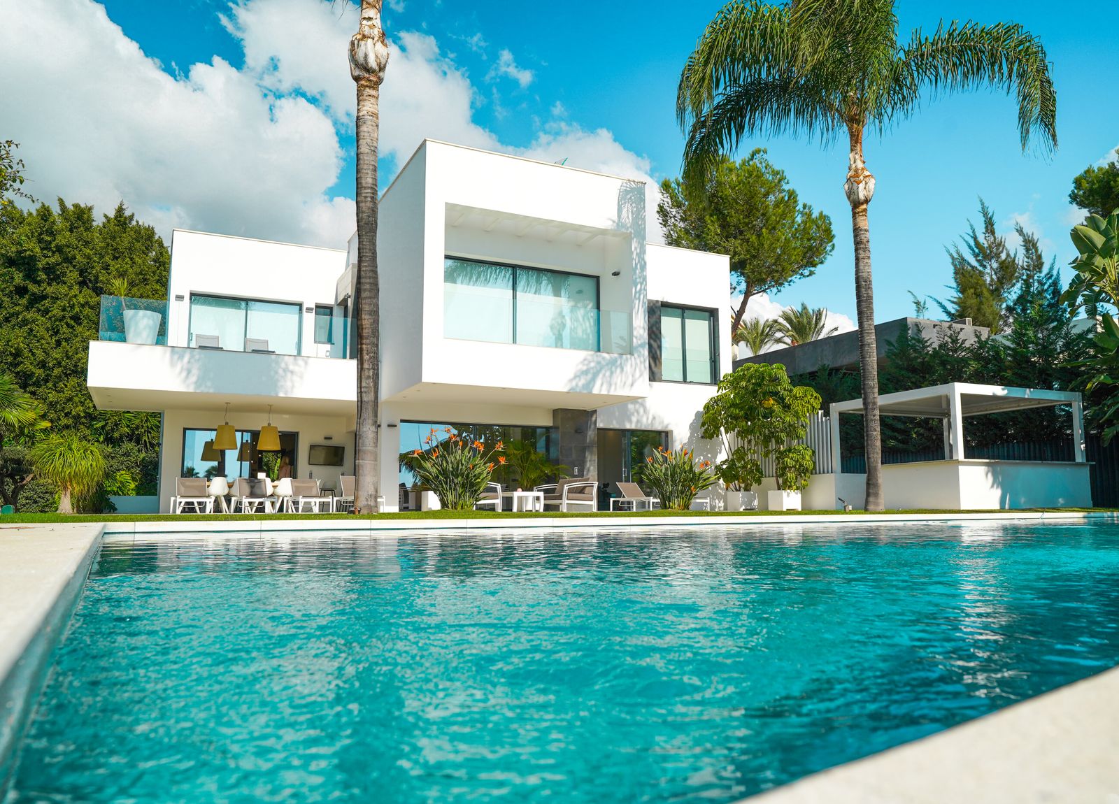 Luxury modern villa in Athens with limestone walls and infinity pool — Living Group real estate development